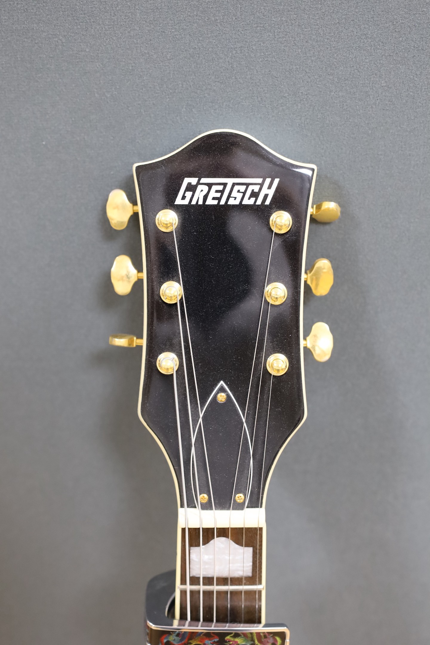 A Gretsch Bigsby electromatic guitar with case